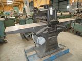 a machine that is sitting in a room with many other machines