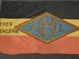 a close up of a flag with a small patch on it
