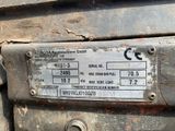 a close up of a metal plate on a truck