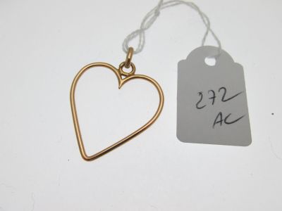 a close up of a tag with a heart on it