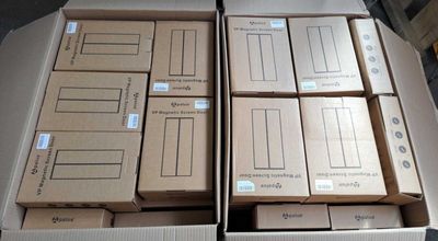 several boxes are stacked on top of each other on a table