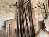 several pieces of wood are stacked on top of each other in a room