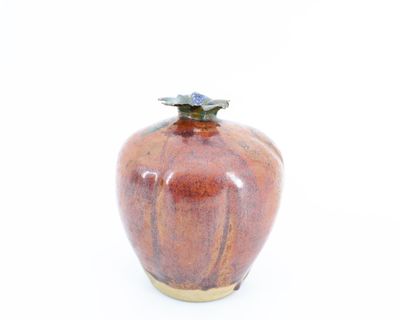 Vase boule cotelé en grès partielement émaillé. Dans le goût…