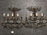 pair of antique wall sconces with crystals and candles