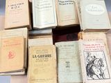 many books that are sitting on top of a table