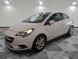 a picture of a white car parked in a garage