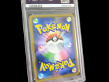 a pokemon news card in a clear plastic holder