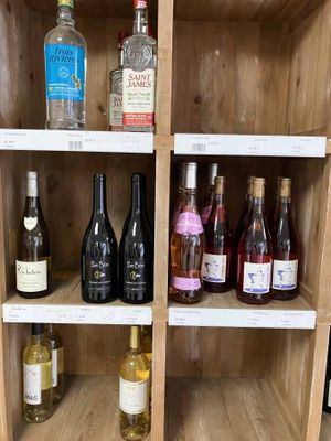 many bottles of wine on the shelves in the room