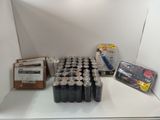 many cans of soda sitting on a shelf in the corner of a room