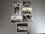 several black and white photographs of a building are hanging on a wall