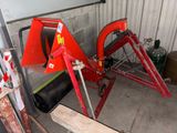 une machine rouge qui se trouve dans un garage