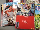 a lot of comic books on the table