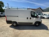 a white van that is parked in a lot