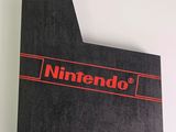 an image of a close up of a nintendo logo on a book