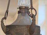 a lamp hanging from the ceiling in a room