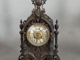 a small clock that is sitting on a table