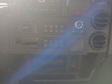 a car dashboard with the sun shining through the window