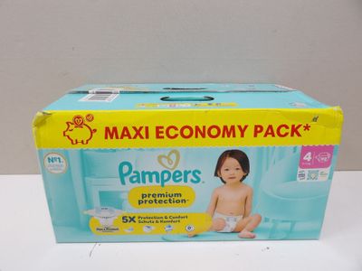 the box of diapers is sitting on the table in front of the box