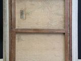 an old picture frame with a picture of a cat in it