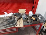 a workbench with tools on it in a garage