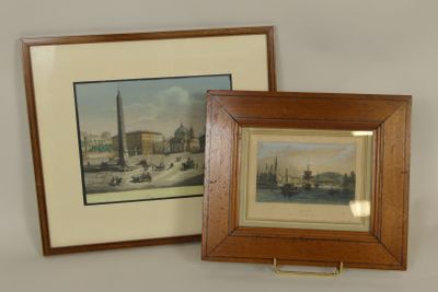 two framed pictures on the wall of a room