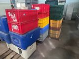 many crates stacked on pallets in a warehouse