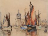 many boats that are in the water near a building