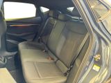 the back seats of a car are empty and the passenger seat is empty
