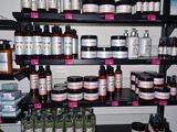 many different types of skin care products on the shelves