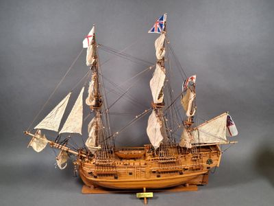 a model of a sailing ship on display on a table