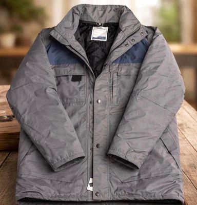 a jacket that is sitting on a wooden table