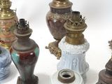 a lot of vases that are sitting on a table