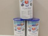 three buckets of water sitting on top of a white counter