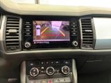 the interior of a car with a dash camera mounted on the dash