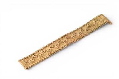 an image of a wooden ruler on a white surface