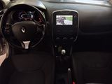 the interior of a car with a steering wheel, dashboard, and dash board