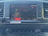 the dashboard of a car with a digital display in the center