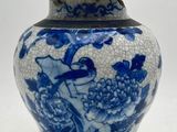 chinese blue and white porcelain jar with lid decorated with flowers and birds