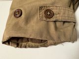 a close up of a pair of pants with buttons on them