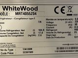a label on the back of a refrigerator that says whitewood