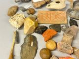many different types of rocks and stones on the table
