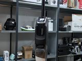 a vacuum that is sitting on a table in a room