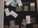 a display case with a lot of stamps on it