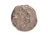 gros plan d'une pièce de monnaie sur une surface blanche avec un fond blanc