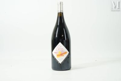 a bottle of wine that is sitting on a table