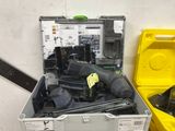 a metal case with tools in it and a yellow box