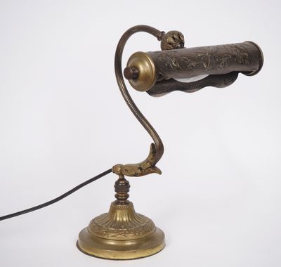 a close up of a lamp on a white surface with a white background