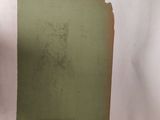 an old book with a drawing of a man in a hat on it