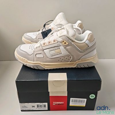 a box with a pair of shoes on top of it