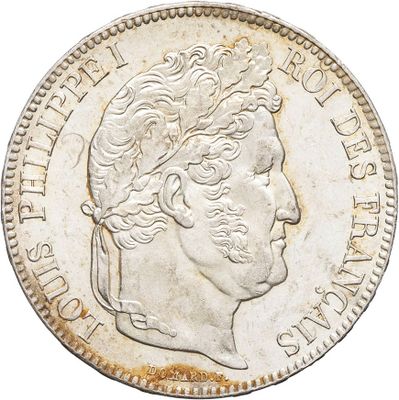 a close up of a coin on a white background